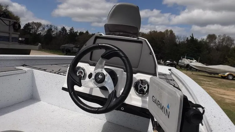 Slide: The Image of 2021 Xpress XP7 boat dashboard with Garmin navigation system. - 15