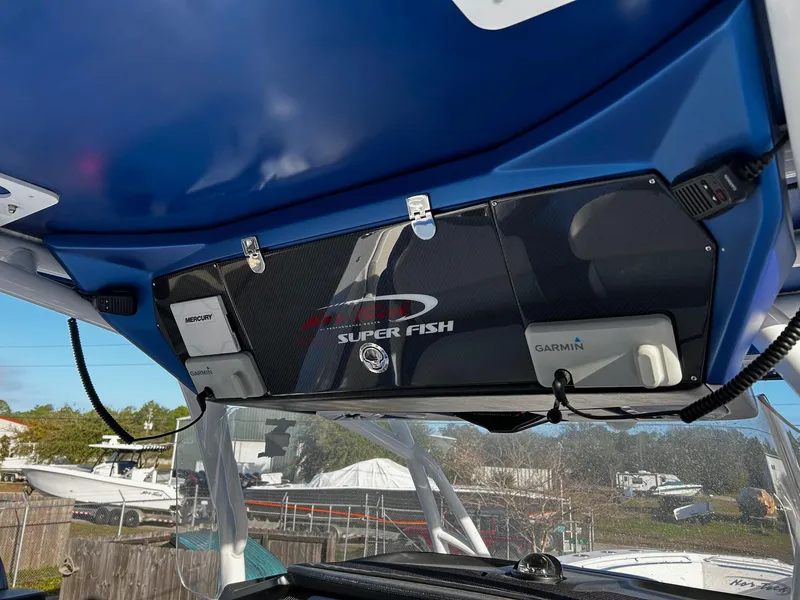 Slide: The Image of 2022 Nor-Tech 392 Superfish boat console with Garmin and Simrad electronics. - 16