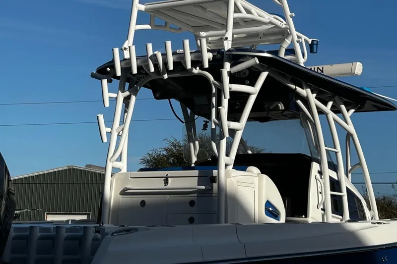 Slide: The Image of 2022 Nor-Tech 392 Superfish boat with rod holders and T-top. - 17