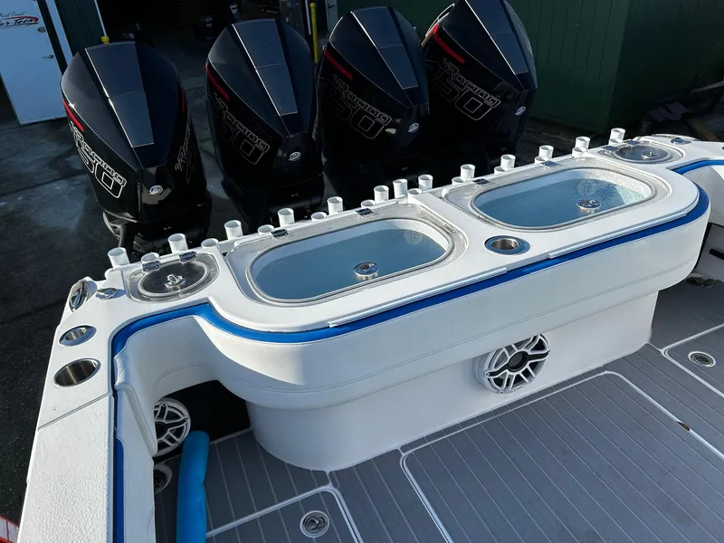 Slide: The Image of 2022 Nor-Tech 392 Superfish boat with four powerful outboard engines. - 21