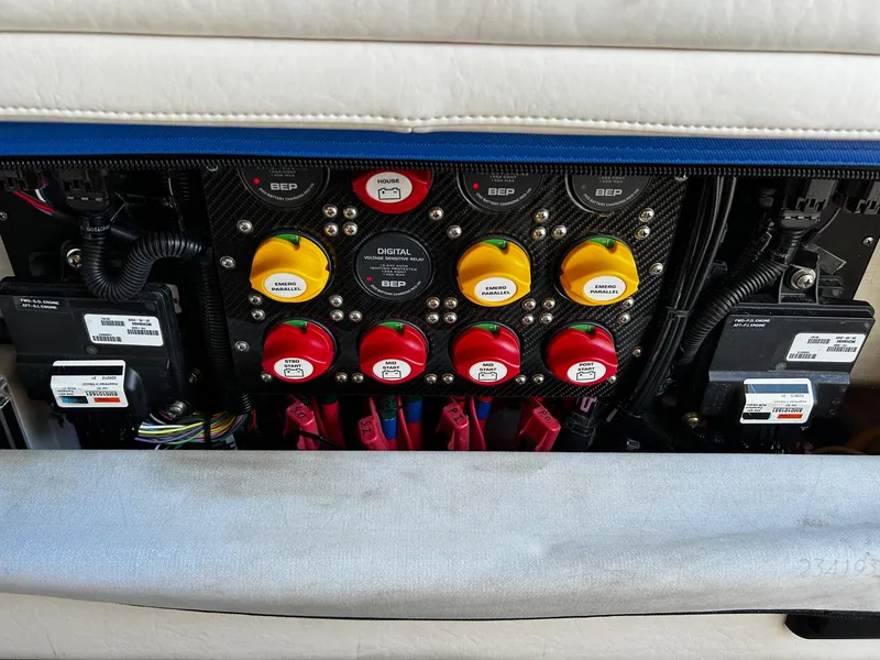 Slide: The Image of Electrical control panel of a 2022 Nor-Tech 392 Superfish boat. - 23