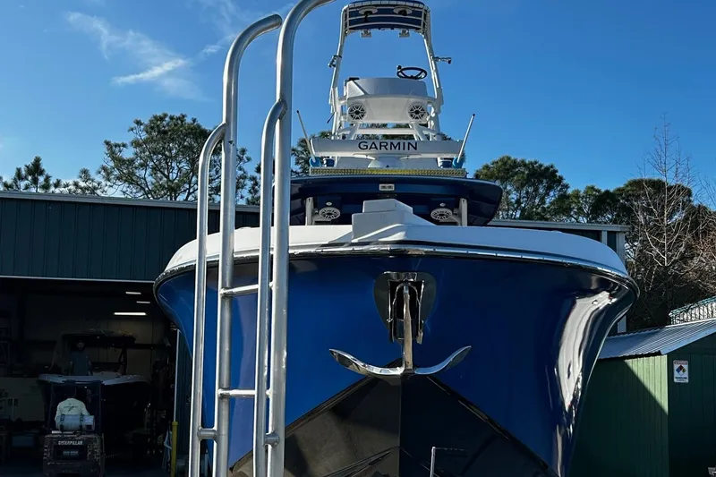 Slide: The Image of 2022 Nor-Tech 392 Superfish boat with Garmin equipment in a boatyard. - 5