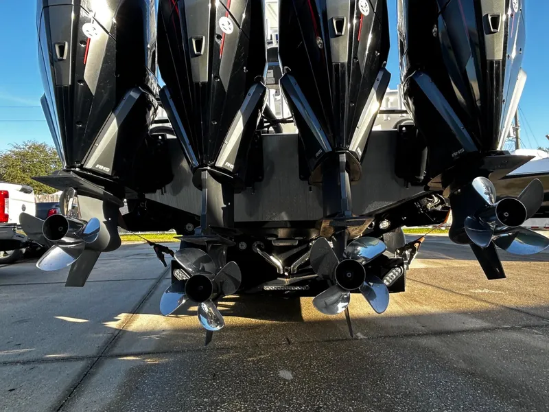 Slide: The Image of 2022 Nor-Tech 392 Superfish boat with multiple outboard engines and propellers. - 6