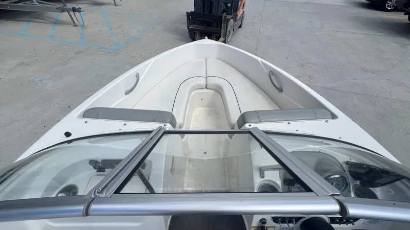 Slide: The Image of 2012 Bayliner 175 Bowrider boat interior view from the cockpit. - 15