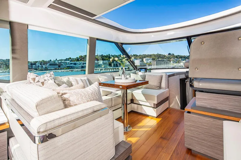 Slide: The Image of Luxurious interior of 2020 Tiara Yachts 49 COUPE with scenic waterfront view. - 12