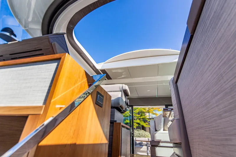 Slide: The Image of Interior view of 2020 Tiara Yachts 49 COUPE with open sunroof. - 16