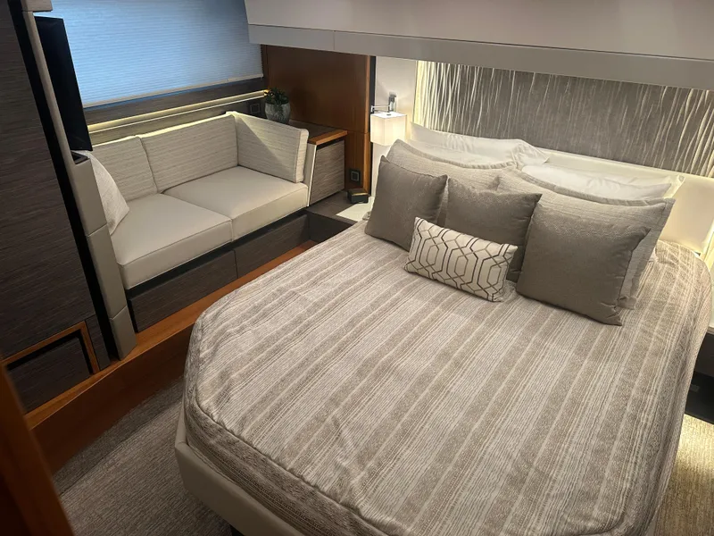 Slide: The Image of Luxurious bedroom interior of 2020 Tiara Yachts 49 COUPE with modern decor and comfortable seating. - 18