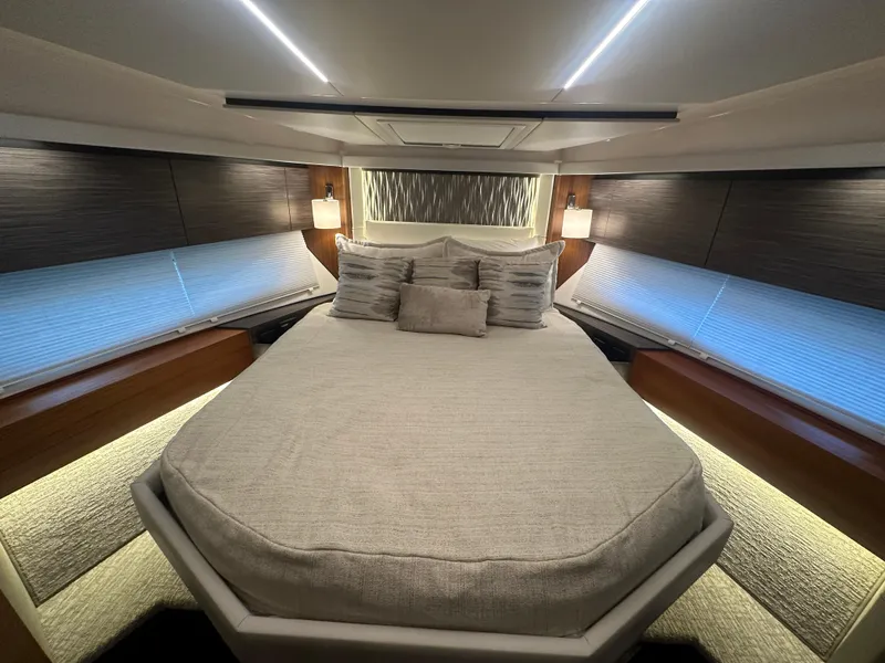 Slide: The Image of Luxurious bedroom interior of 2020 Tiara Yachts 49 COUPE with modern lighting. - 26