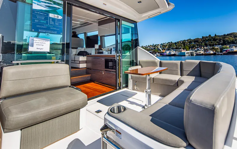Slide: The Image of 2020 Tiara Yachts 49 COUPE luxury interior with waterfront view. - 4