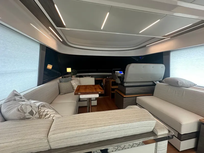 Slide: The Image of Luxurious interior of 2020 Tiara Yachts 49 COUPE with modern seating and elegant design. - 8