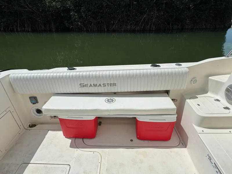 Slide: The Image of Seamaster 2800 Walkaround 2002 boat with seating and storage compartments. - 19