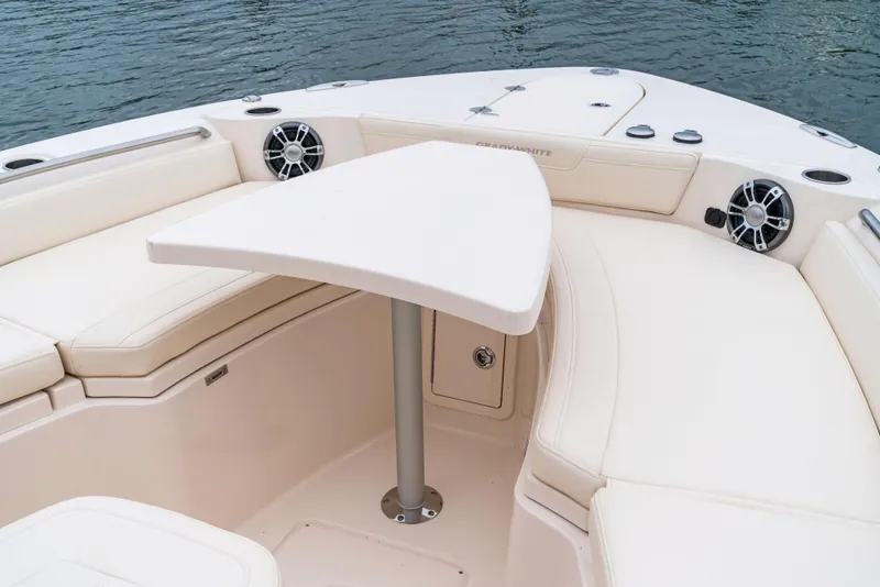 Slide: The Image of 2024 Grady-White 281 boat interior with seating and table. - 3