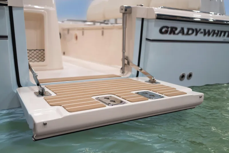 Slide: The Image of 2024 Grady-White 281 boat swim platform on water. - 8