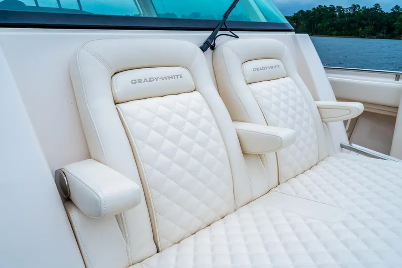 Slide: The Image of Grady-White 386 Canyon 2024 boat seats with diamond-stitched upholstery. - 7