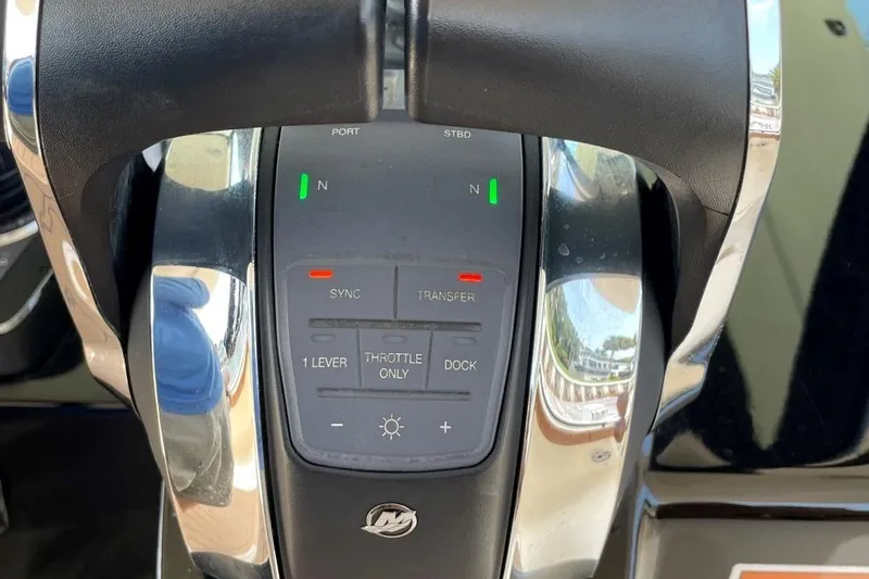 Slide: The Image of Close-up of 2020 Scout 420 LXF boat throttle controls. - 35