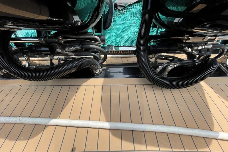 Slide: The Image of 2020 Scout 420 LXF boat deck with engine components and wiring. - 43