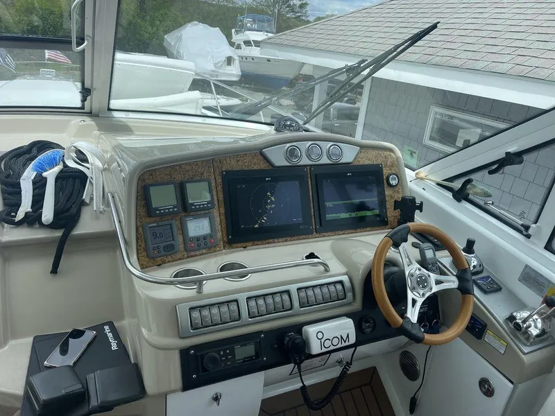 Slide: The Image of 2009 Formula 45 Yacht helm with navigation screens and controls. - 10