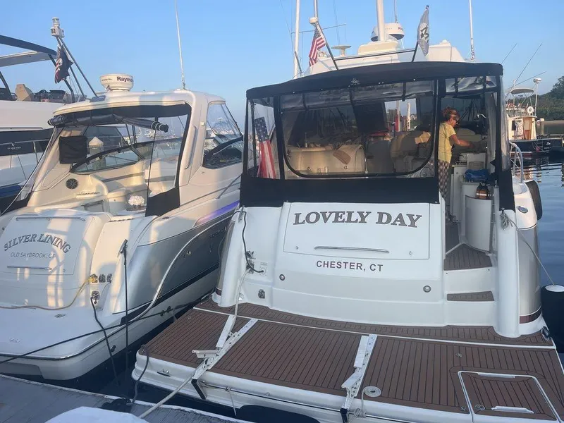 Slide: The Image of 2009 Formula 45 Yacht docked next to another yacht, Lovely Day, Chester, CT. - 3