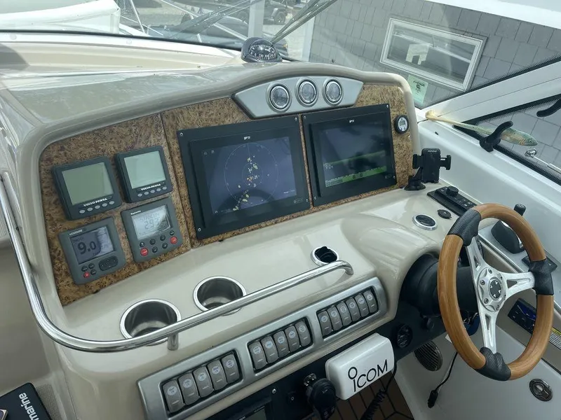 Slide: The Image of 2009 Formula 45 Yacht helm with navigation screens and controls. - 8