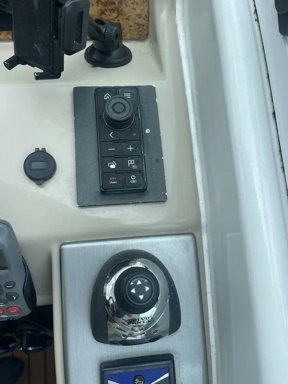 Slide: The Image of Control panel and joystick of a 2009 Formula 45 Yacht. - 9