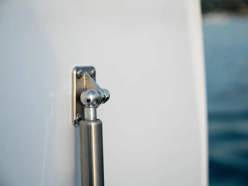 Slide: The Image of Close-up of a 2025 Mag Bay 33 CC boat's stainless steel hardware. - 20