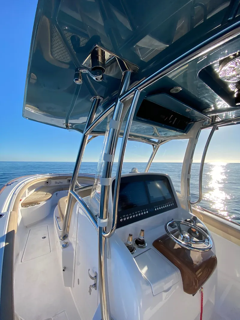 Slide: The Image of 2025 Mag Bay 33 CC center console boat with advanced navigation system. - 4