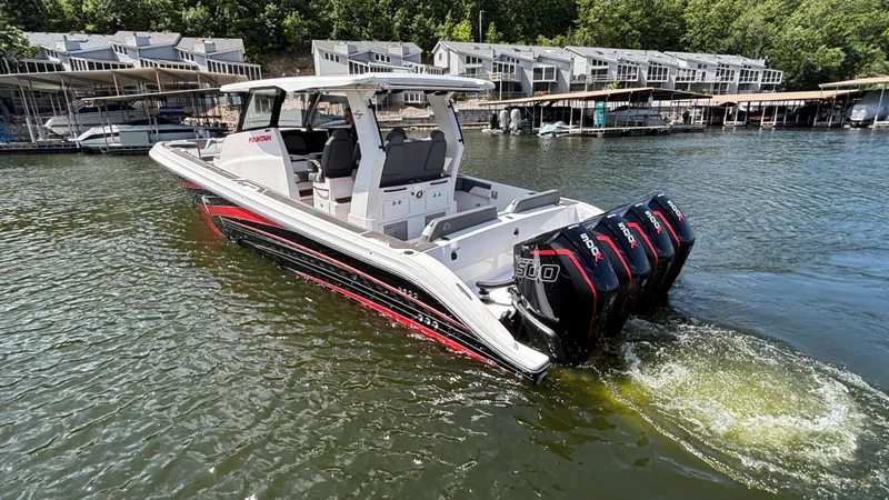 Slide: The Image of 2024 Fountain 43 SCX boat with quad engines on a scenic lake. - 10