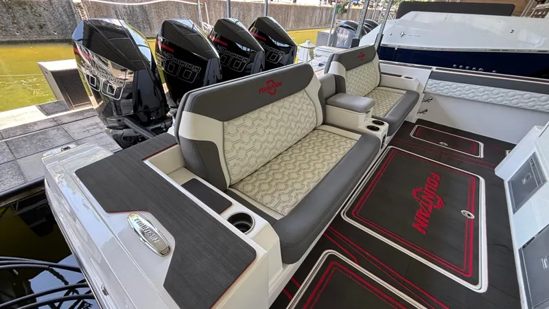 Slide: The Image of 2024 Fountain 43 SCX boat interior with luxurious seating and powerful outboard engines. - 18