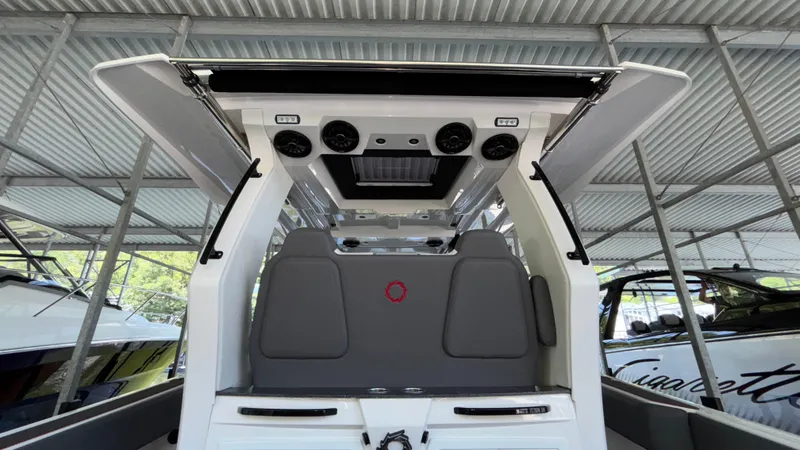 Slide: The Image of 2024 Fountain 43 SCX boat interior with modern seating and overhead speakers. - 25