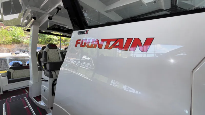 Slide: The Image of 2024 Fountain 43 SCX boat interior with logo, showcasing luxury seating and modern design. - 36