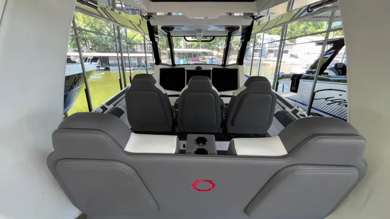 Slide: The Image of Interior of 2024 Fountain 43 SCX boat with modern seating and dashboard. - 42