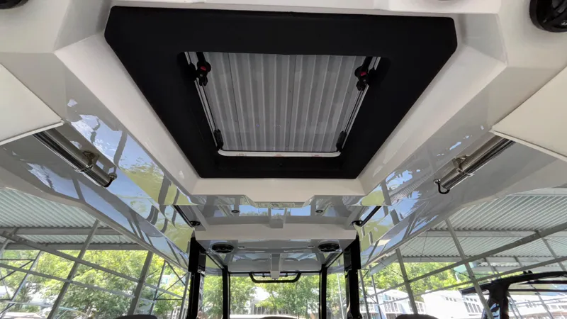 Slide: The Image of 2024 Fountain 43 SCX boat interior with sunroof and sleek design. - 43