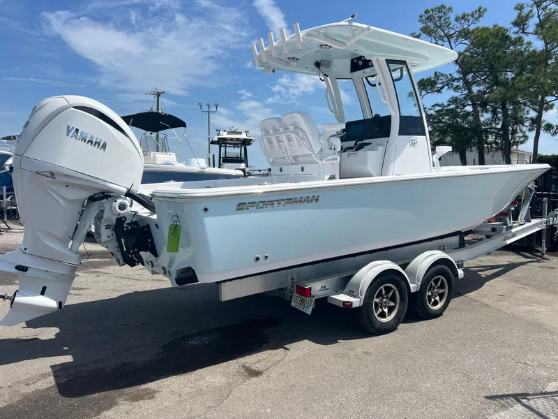 Slide: The Image of 2024 Sportsman 247 OE boat on trailer with Yamaha outboard motor. - 3