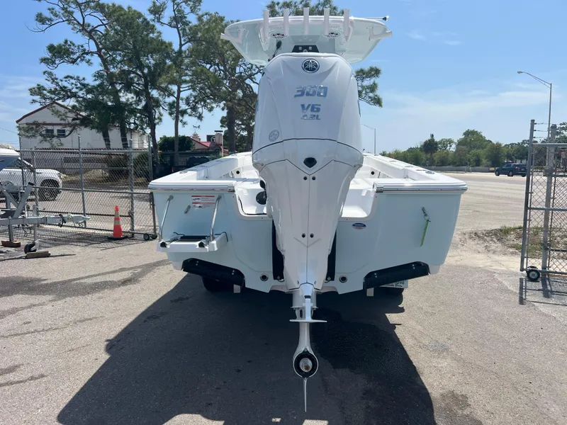 Slide: The Image of 2024 Sportsman 247 OE boat with Yamaha 300 V6 outboard motor, rear view. - 4