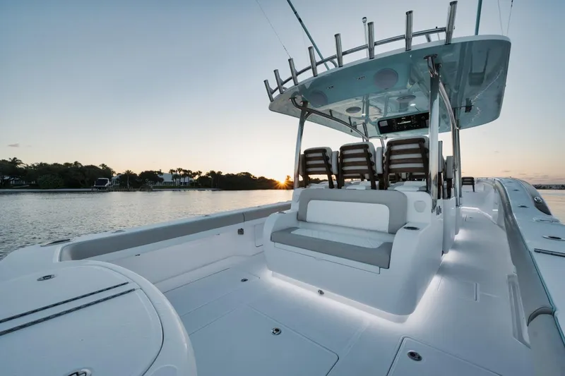 Slide: The Image of 2025 Mag Bay 43 CC boat interior at sunset on the water. - 17