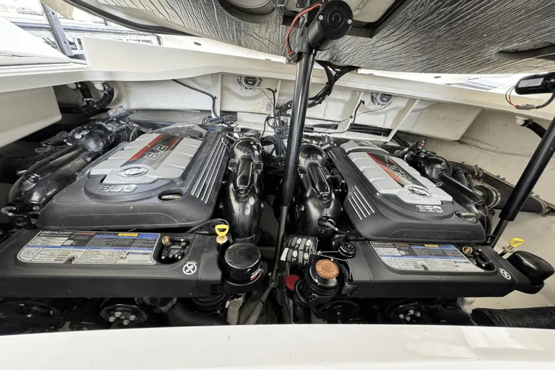 Slide: The Image of Twin engines in a 2021 Sea Ray 310 SLX boat, showcasing powerful Mercury 350 horsepower. - 28