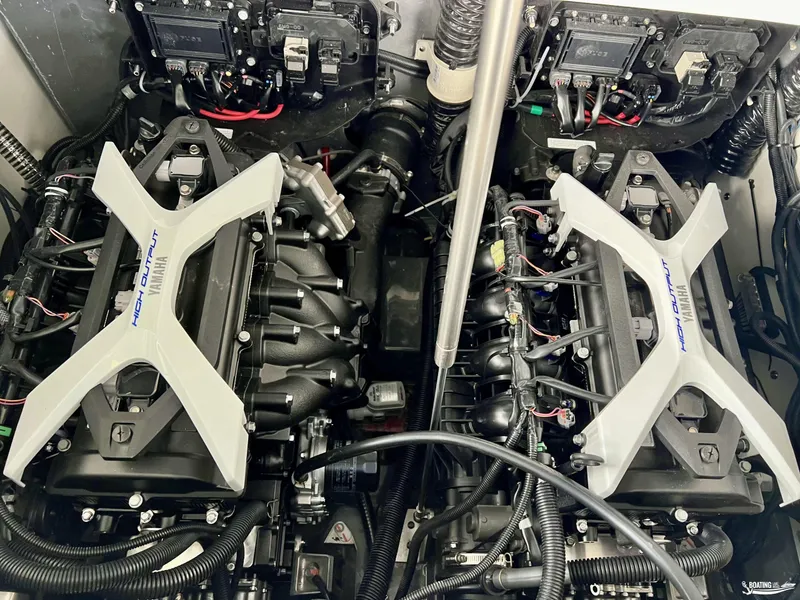 Slide: The Image of 2024 Yamaha Boats 222 FSH Sport engine compartment with high output engines. - 8