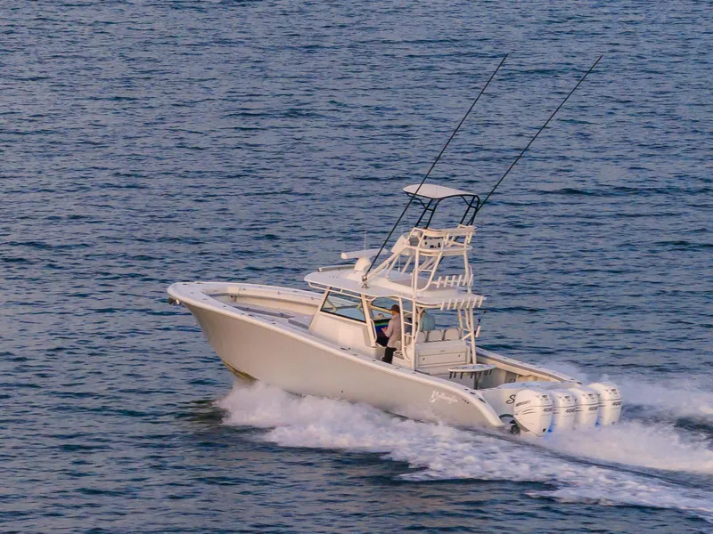 Slide: The Image of 2022 Yellowfin 42 boat cruising on the water. - 15
