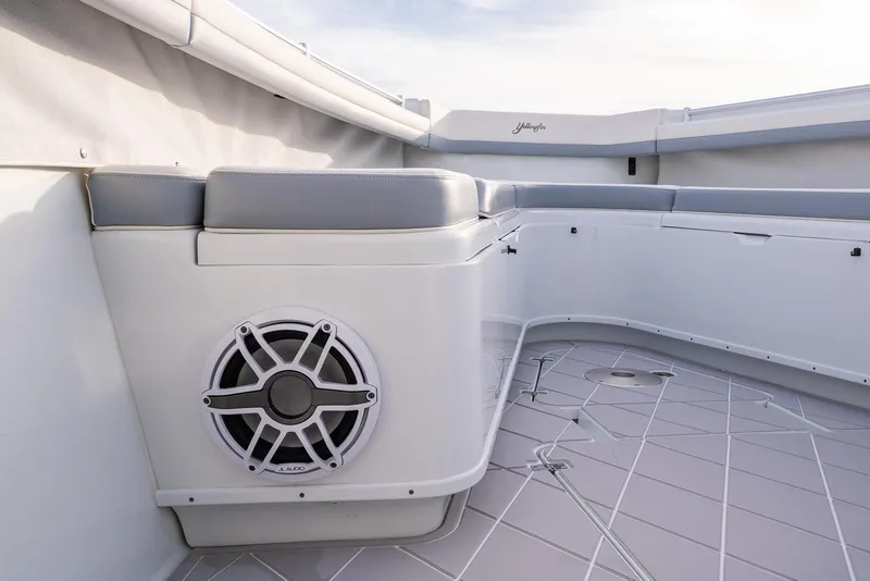 Slide: The Image of Interior seating and speaker system of a 2022 Yellowfin 42 boat. - 30