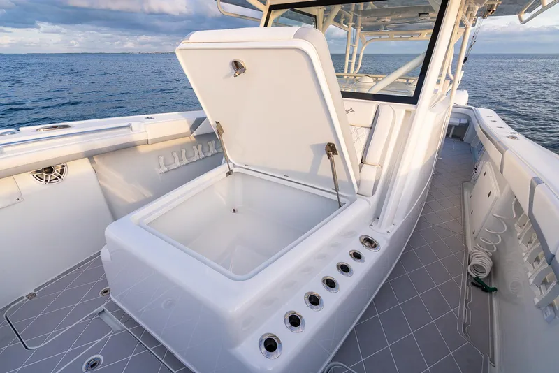 Slide: The Image of 2022 Yellowfin 42 boat with open storage compartment on deck. - 31