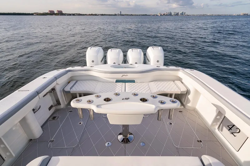 Slide: The Image of 2022 Yellowfin 42 boat with quad engines on open water. - 34