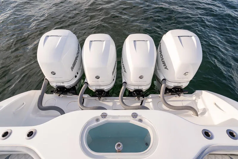Slide: The Image of 2022 Yellowfin 42 boat with four Mercury outboard engines on water. - 38