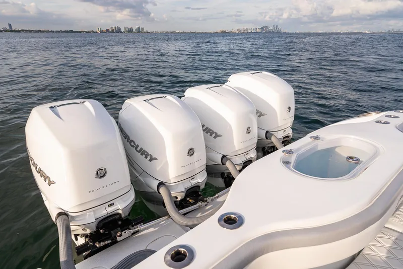 Slide: The Image of 2022 Yellowfin 42 boat with four Mercury outboard engines on the water. - 39