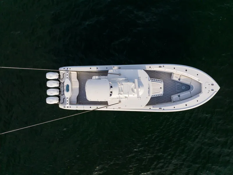 Slide: The Image of Aerial view of 2022 Yellowfin 42 boat with four outboard motors. - 8
