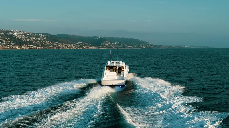 Slide: The Image of Mag Bay 42 yacht cruising on open water, 2025 model. - 10