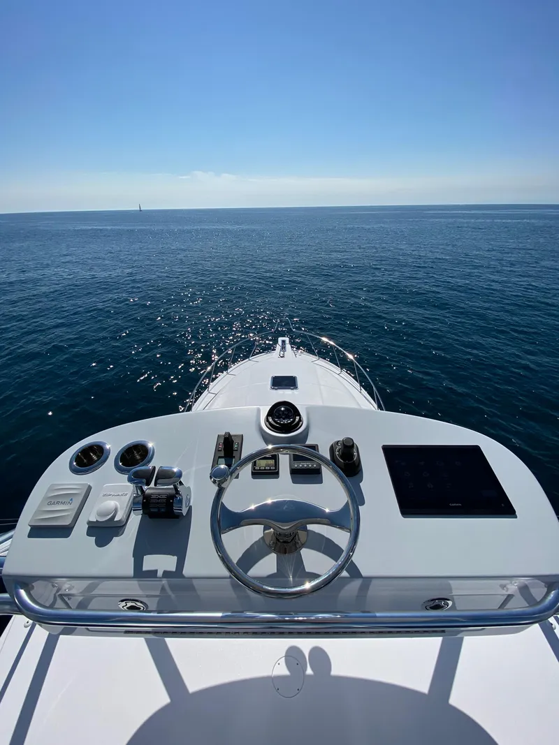 Slide: The Image of 2025 Mag Bay 42 yacht helm with ocean view. - 20