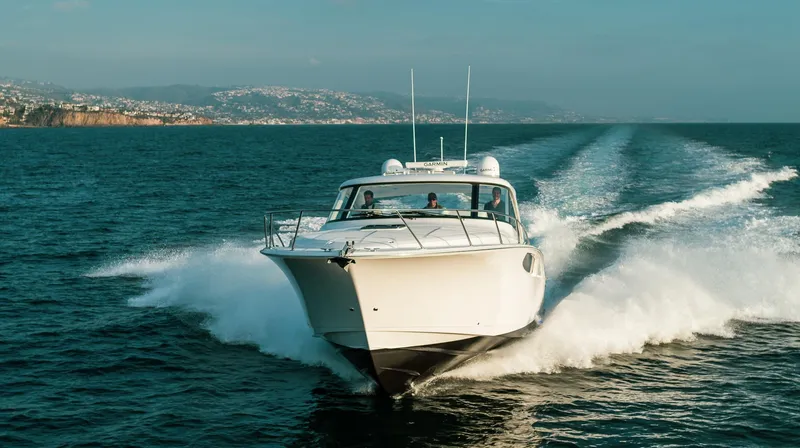 Slide: The Image of 2025 Mag Bay 42 yacht cruising on open water. - 4