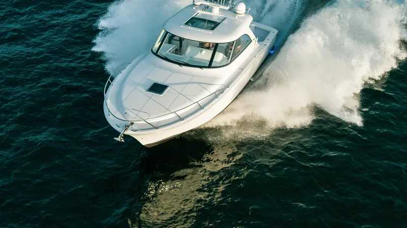 Slide: The Image of 2025 Mag Bay 42 yacht cruising on open water. - 5