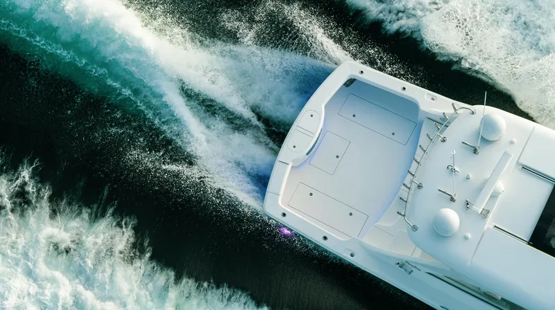 Slide: The Image of Aerial view of 2025 Mag Bay 42 yacht cruising through water. - 6