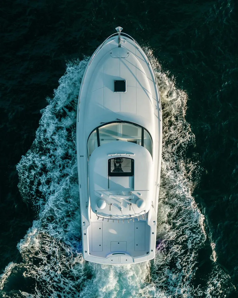Slide: The Image of Aerial view of 2025 Mag Bay 42 yacht cruising on the ocean. - 8